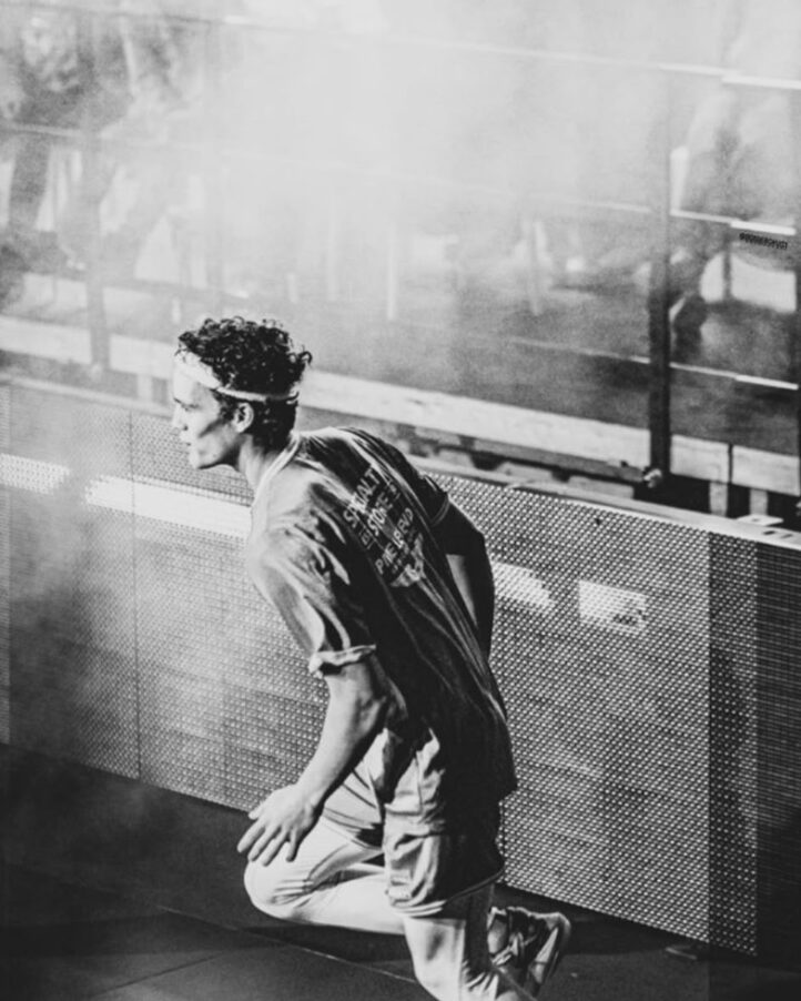 Bob running across the basketball court, black and white, from his years as a pro player